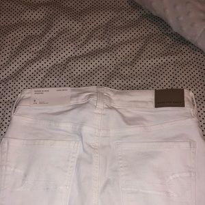 white ripped high-rise american eagle jeggings